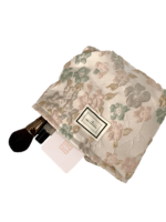 Neceser de maquillaje en tejido brocado floral rosa Neceser de maquillaje en tejido brocado floral rosa
