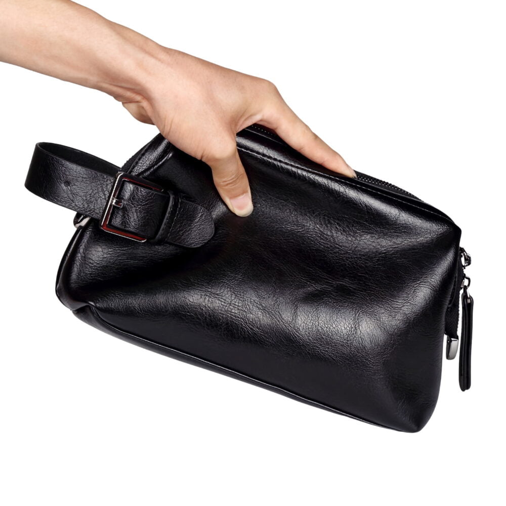 Trousse de toilette imitation cuir veritable noir tenue en main Trousse de toilette imitation cuir veritable noir tenue en main