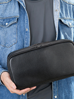 Grande trousse de toilette en cuir triple compartiment avec pochettes et elastiques noir texture lisse pratique pour voyages 3.png